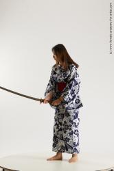 Casual Fighting with sword Woman Asian Sitting poses - ALL Slim medium black Sitting poses - simple Standard Photoshoot Academic