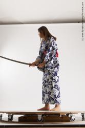 Casual Fighting with sword Woman Asian Sitting poses - ALL Slim medium black Sitting poses - simple Standard Photoshoot Academic