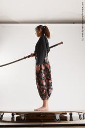 Sportswear Fighting with sword Woman Asian Slim long black Multi angle poses Academic