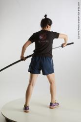 Sportswear Fighting with sword Woman Black Standing poses - ALL Average medium black Standing poses - simple Standard Photoshoot Academic