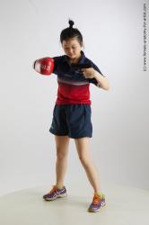 Sportswear Fighting with gun Woman Asian Standing poses - ALL Average medium black Standing poses - simple Standard Photoshoot Academic